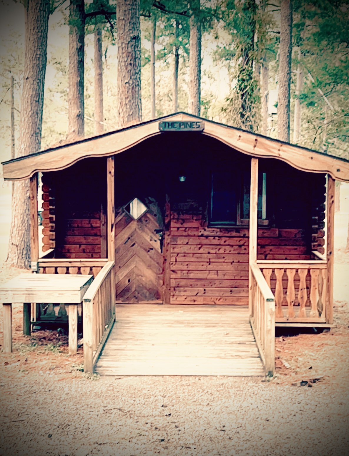Wooden Marina Village cabin with porch and access ramp