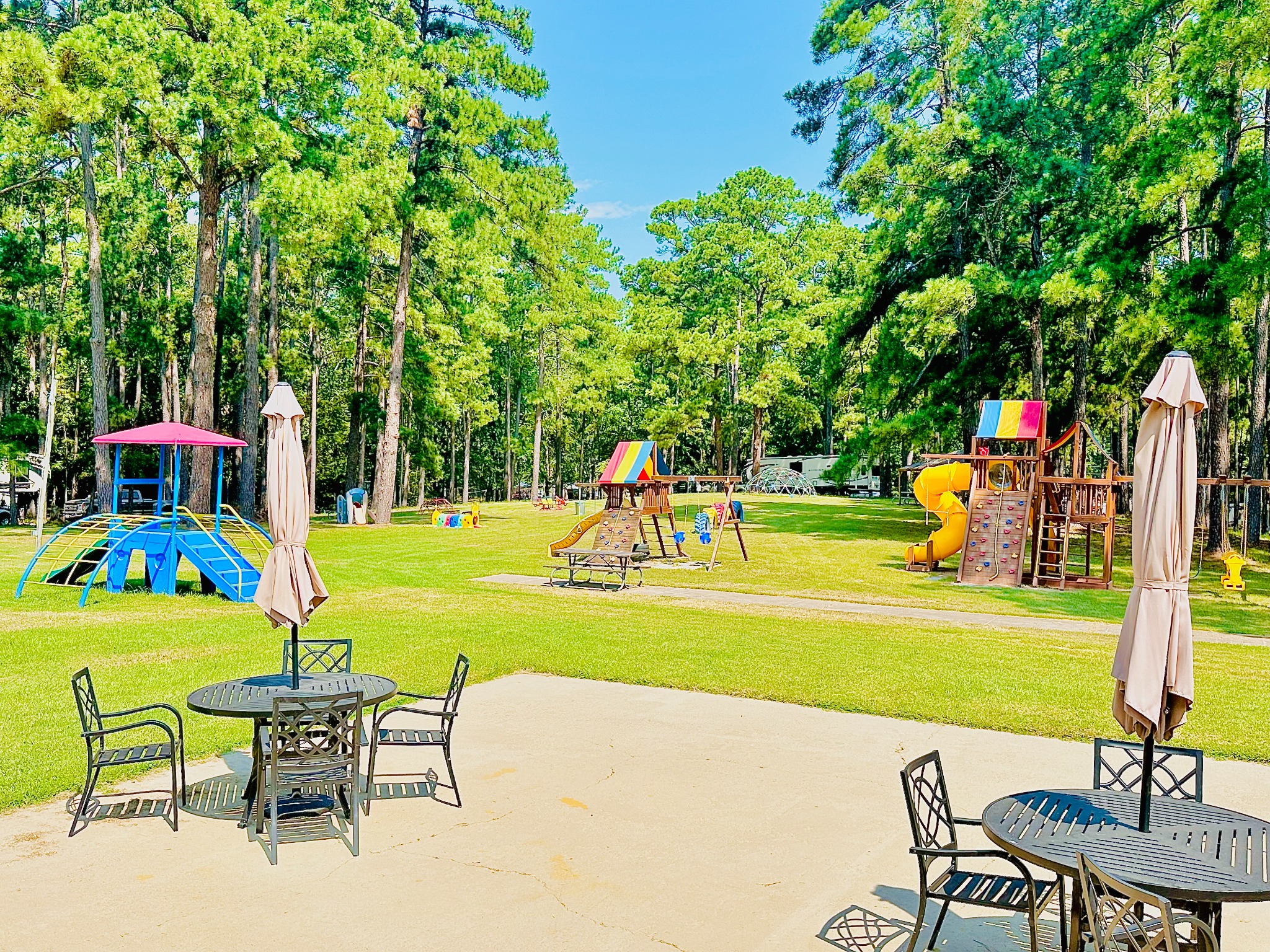 Colorful playground and family gathering area at Marina Village Resort